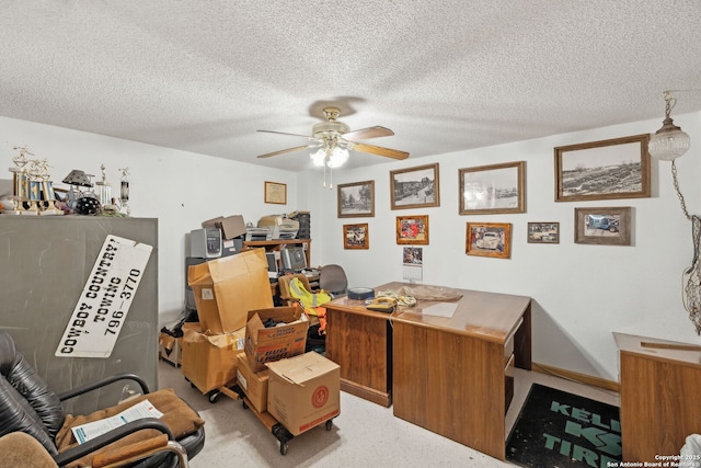 office space with ceiling fan and a textured ceiling