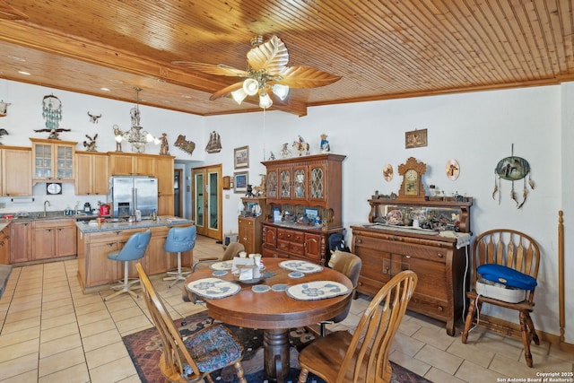 dining room with sink, wooden ceiling, light tile patterned flooring, and crown molding