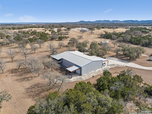 bird's eye view with a rural view and a mountain view