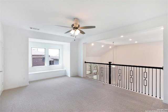 228 Dulce, Boerne, TX 78006 - spare room featuring ceiling fan, carpet flooring, vaulted ceiling, recessed lighting, and baseboards