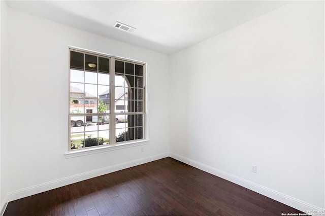 228 Dulce, Boerne, TX 78006 - unfurnished room with dark wood finished floors and baseboards