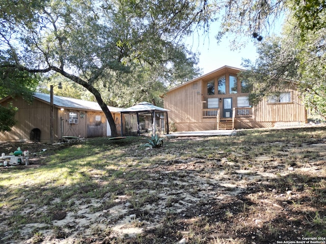 view of yard featuring a wooden deck