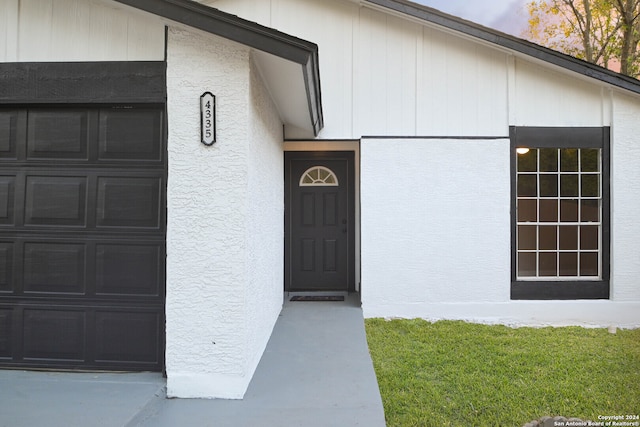 entrance to property with a garage