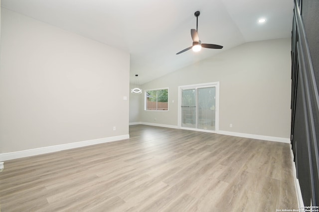 unfurnished living room featuring light hardwood / wood-style flooring, lofted ceiling, and ceiling fan