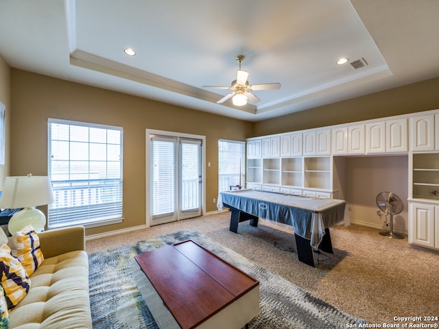 game room featuring billiards, light carpet, ceiling fan, and a tray ceiling