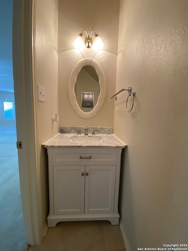 bathroom with vanity and tile patterned floors