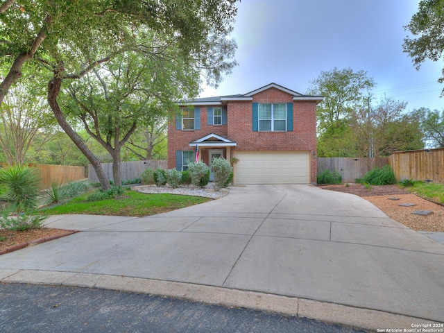 view of front of property featuring a garage