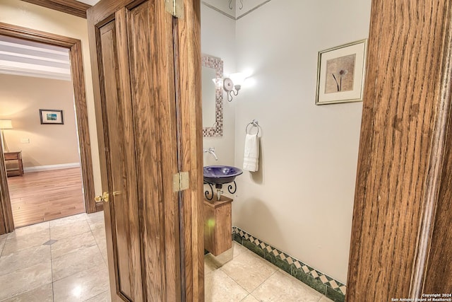 bathroom with sink and tile patterned floors