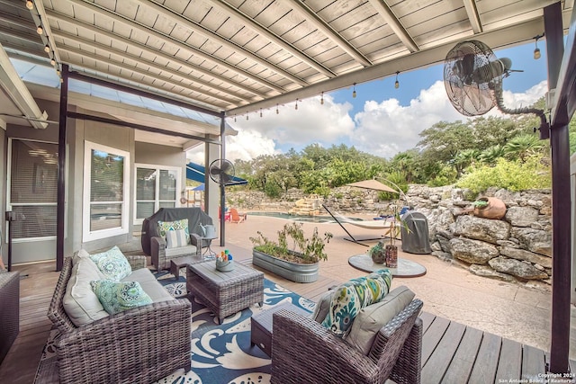 view of patio with an outdoor hangout area and a swimming pool side deck