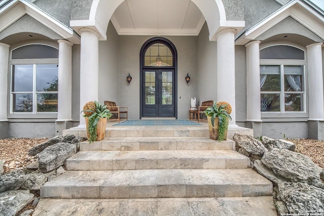 property entrance with french doors and covered porch