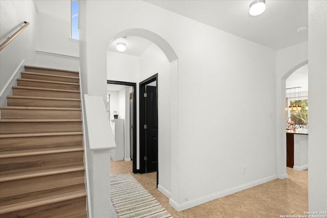 interior space with light tile patterned floors