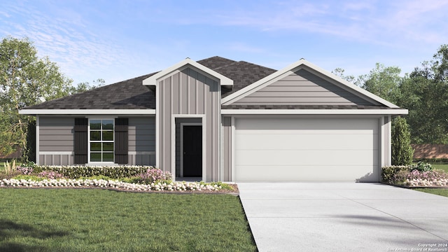 view of front of property featuring a garage and a front yard