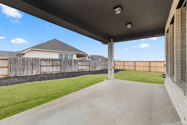 view of patio with a fenced backyard