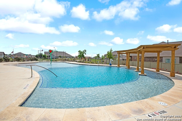 view of pool with a patio