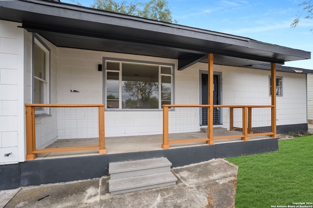 property entrance with a porch