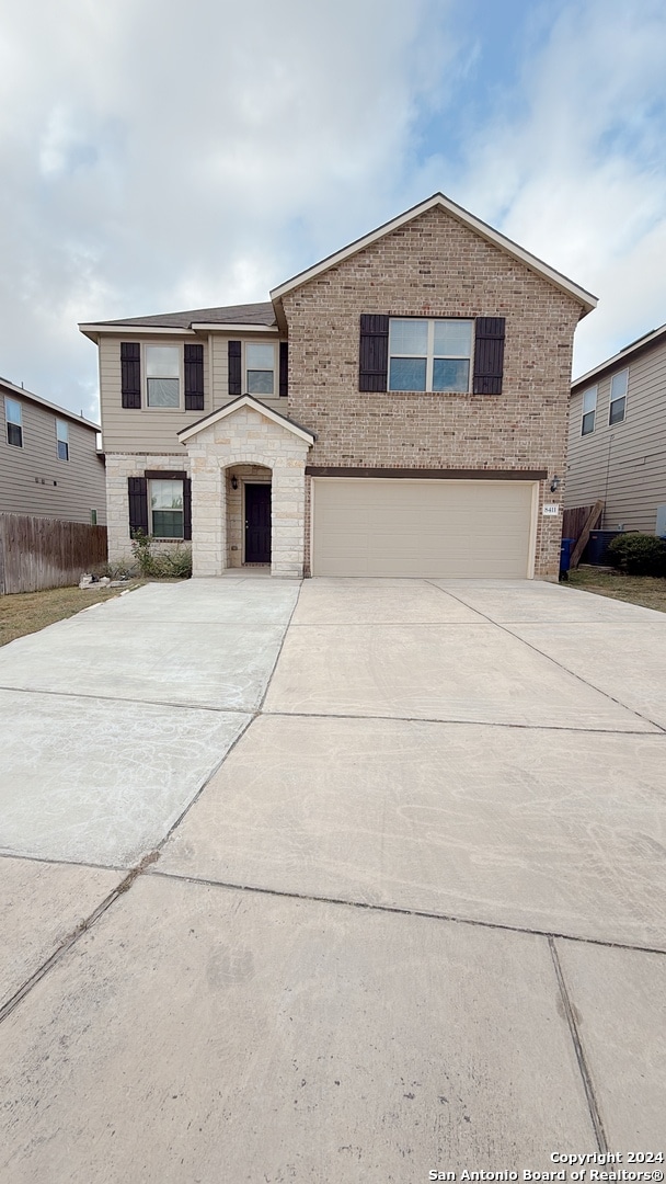 view of front of property featuring a garage