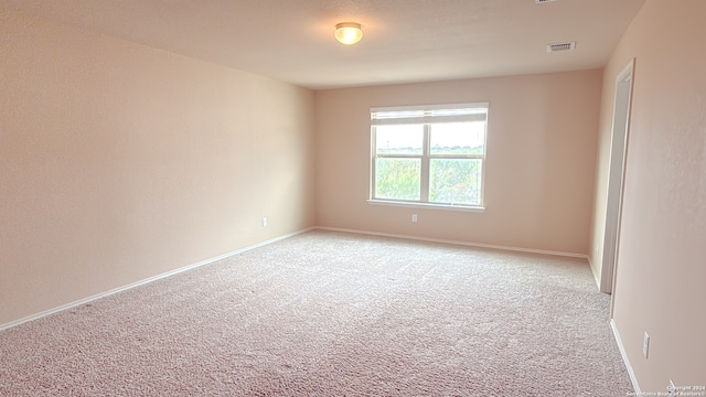 empty room with light carpet