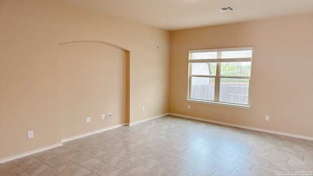 view of tiled empty room