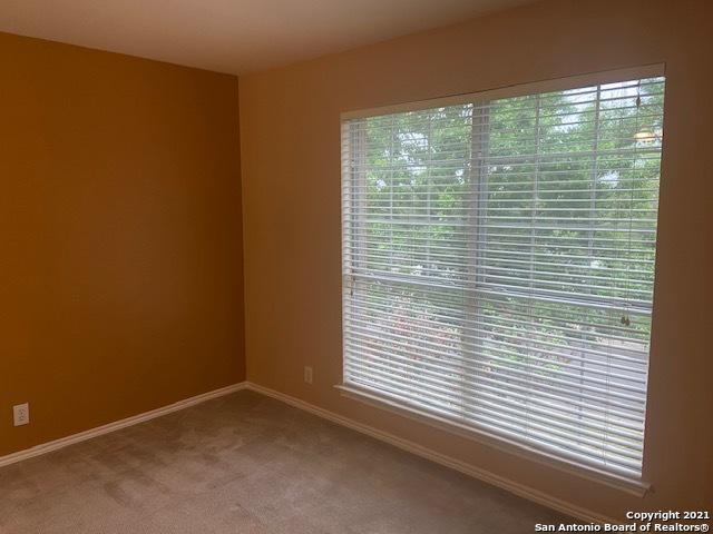 5306 Stormy Breeze, San Antonio, TX 78247 - carpeted spare room featuring baseboards