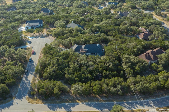 drone / aerial view with a forest view