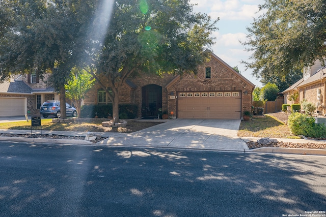 view of front of property with a garage