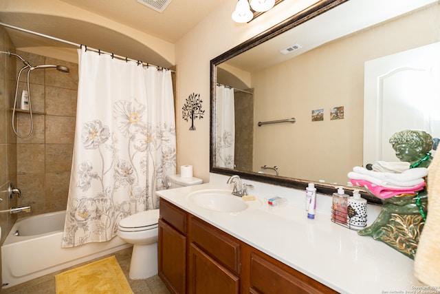 full bathroom featuring shower / bath combo with shower curtain, vanity, and toilet