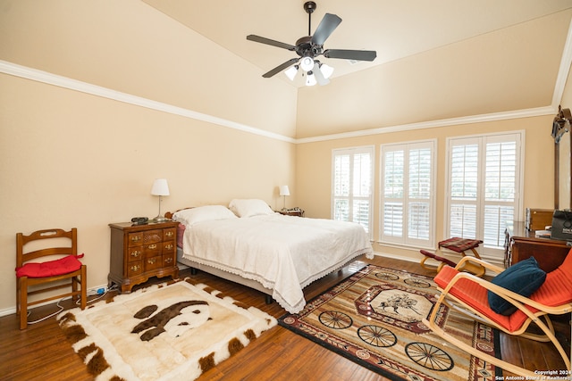 bedroom featuring crown molding, dark hardwood / wood-style floors, and ceiling fan