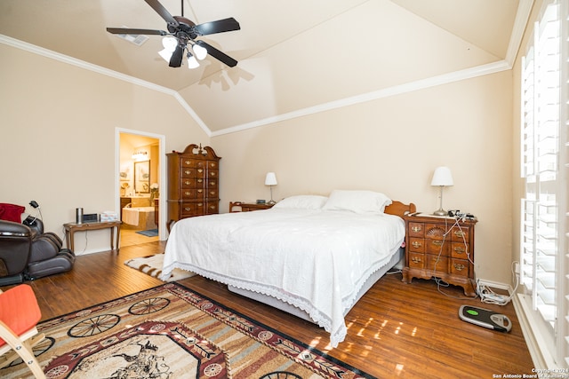 bedroom featuring ensuite bathroom, hardwood / wood-style floors, lofted ceiling, and ceiling fan