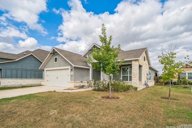 12009 Vignette, Schertz, TX 78154 - view of front of house featuring stone siding, roof with shingles, concrete driveway, a garage, and a front yard