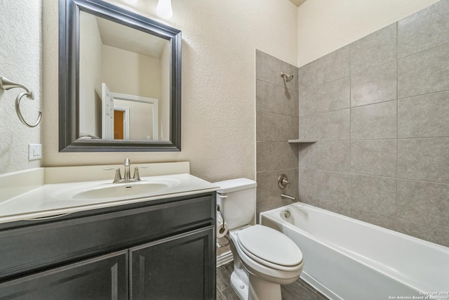 12009 Vignette, Schertz, TX 78154 - bathroom featuring a textured wall, toilet, vanity, and bathtub / shower combination
