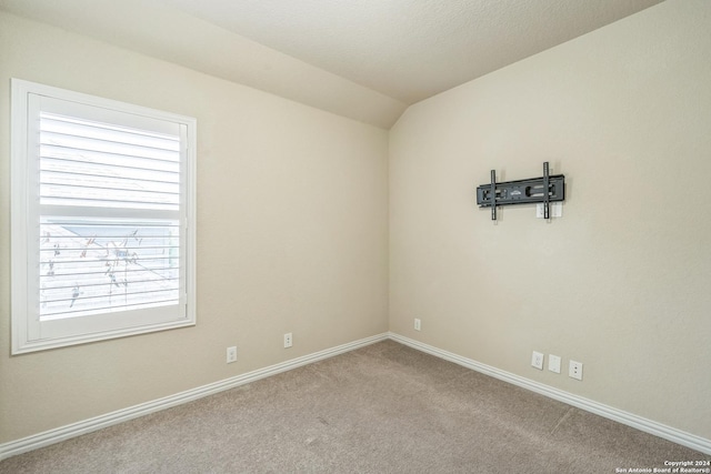 12009 Vignette, Schertz, TX 78154 - carpeted empty room with baseboards and vaulted ceiling