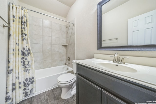 full bathroom with toilet, shower / tub combo, vanity, and hardwood / wood-style flooring