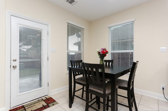 view of tiled dining space