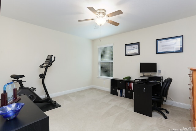 office area featuring ceiling fan and light colored carpet