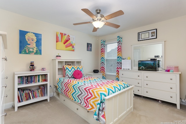 carpeted bedroom with ceiling fan