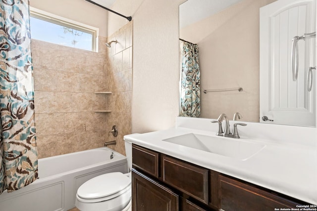 full bathroom with vanity, toilet, and shower / bath combination with curtain