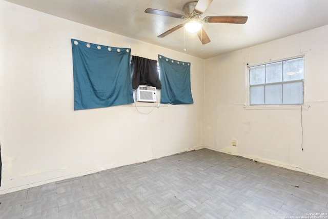 unfurnished room with ceiling fan