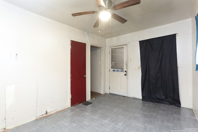 unfurnished room featuring ceiling fan