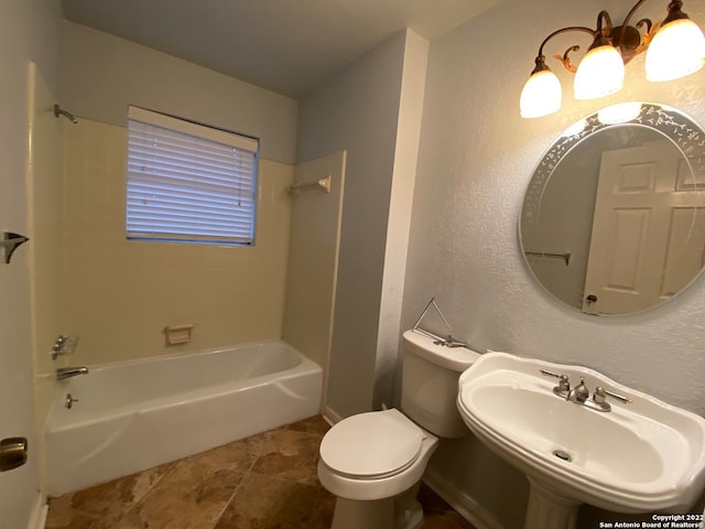 full bathroom with toilet, tub / shower combination, sink, and tile patterned flooring