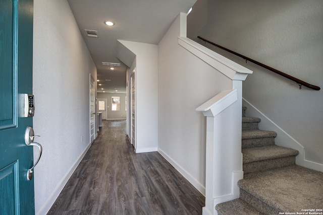 entrance foyer featuring dark hardwood / wood-style flooring