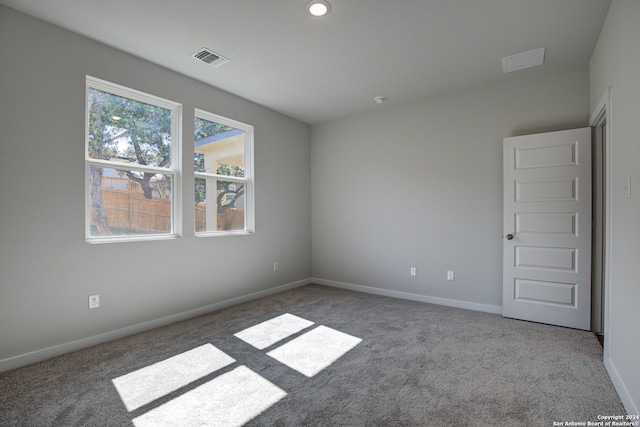 view of carpeted spare room