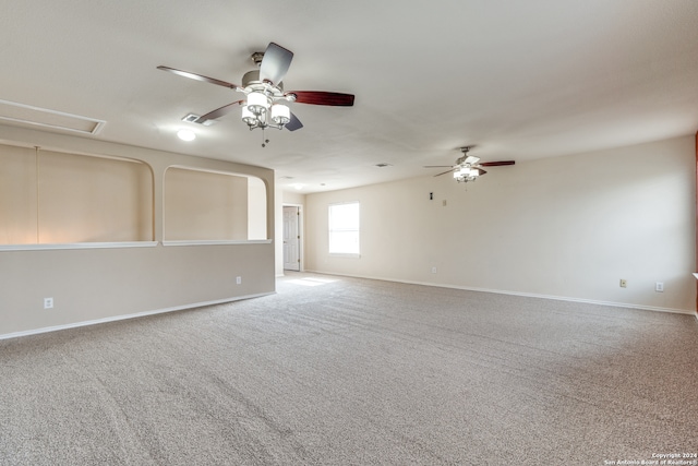 spare room with carpet and ceiling fan