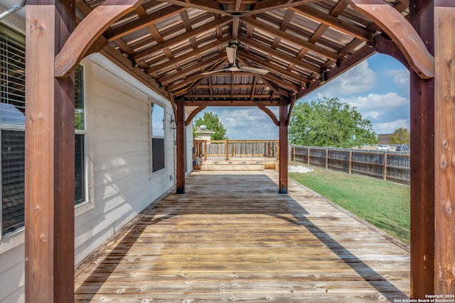 deck with a lawn and a gazebo