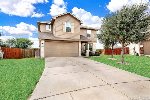 view of front property with a front lawn and a garage