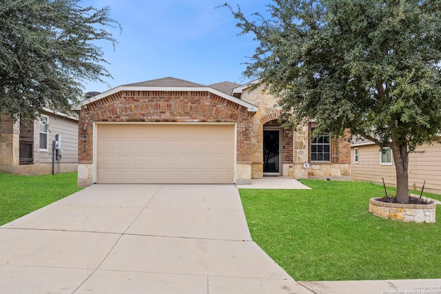 view of front of house with a garage and a front lawn