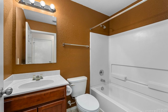 full bathroom with toilet, shower / bath combination, vanity, and a textured ceiling