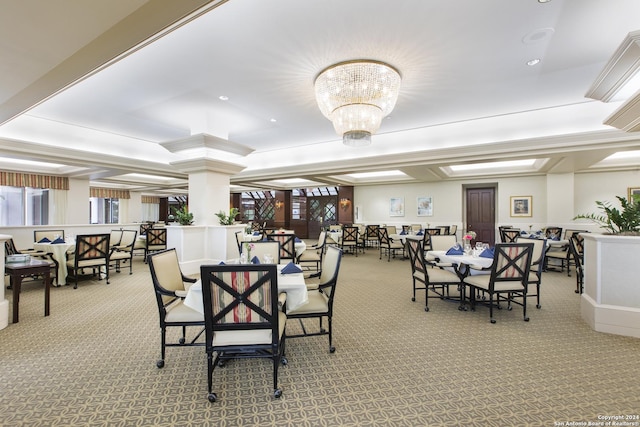 dining area with light carpet and a notable chandelier