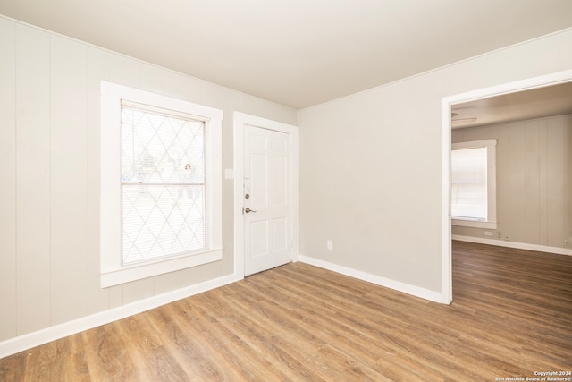 empty room with hardwood / wood-style floors