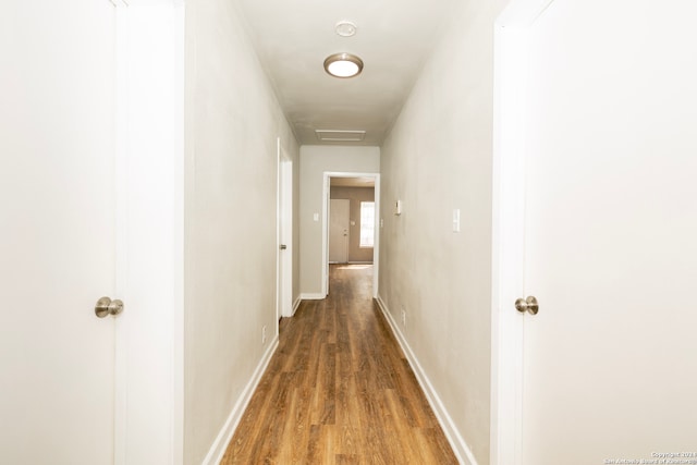 hall featuring dark hardwood / wood-style floors