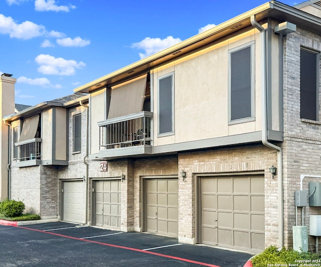 view of building exterior featuring an attached garage